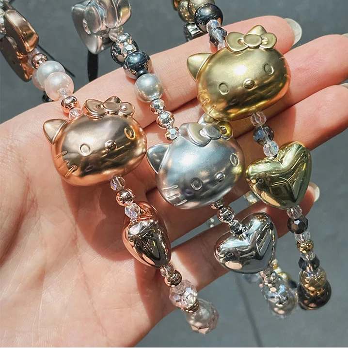 TOP TOY Hello Kitty Gold Glitter Phone Charms – Phone Strap, Mini Charm & Shoulder Lanyard